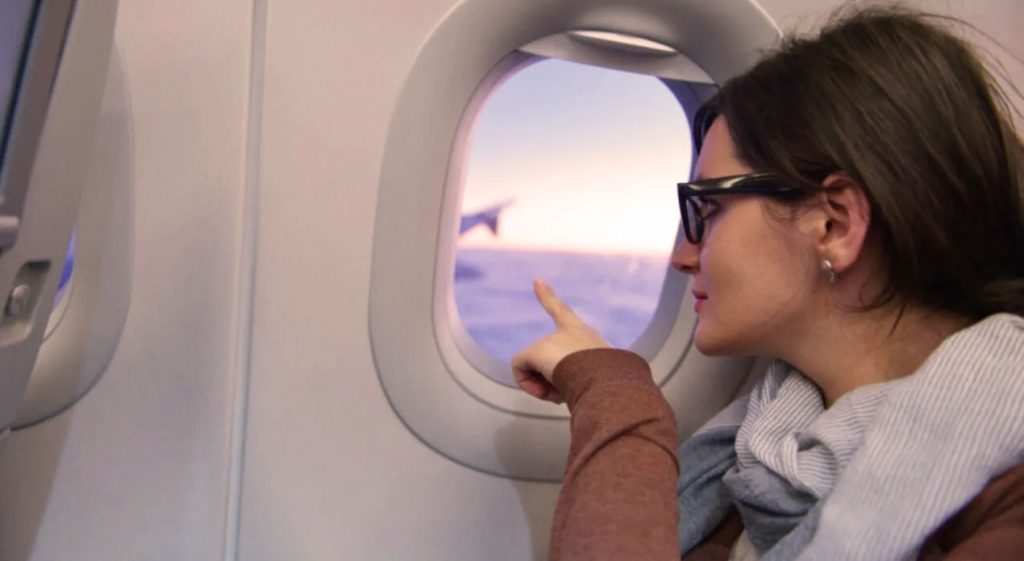  seat-over-the-wings-in-plane-for-travel-sickness